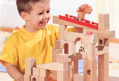Hours of fun – and learning – start with ball track and domino sets that grow with the child