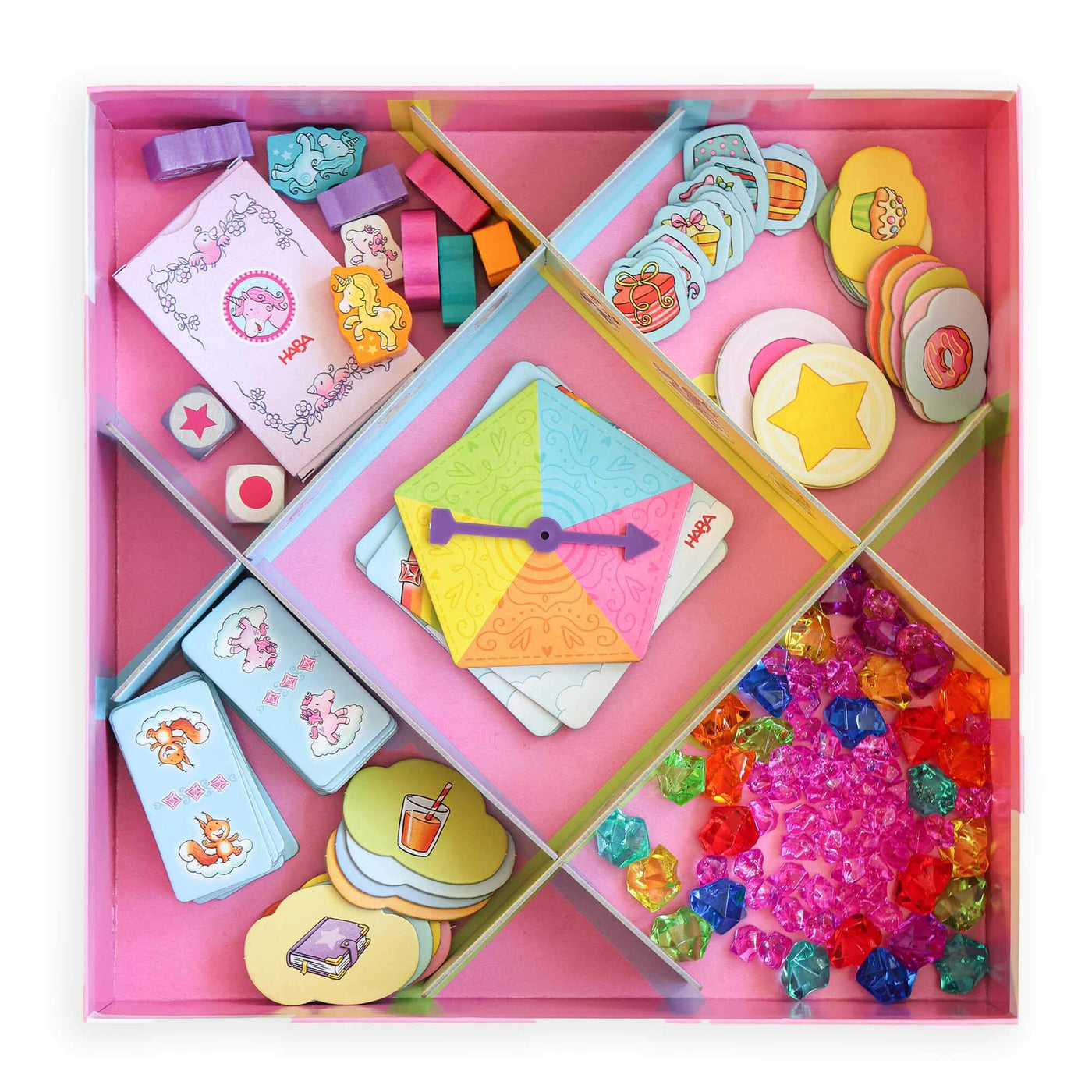 HABA Unicorn Glitterluck Game Collection  with various pieces in a pink box
