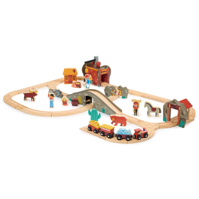 Wooden toy train set with tracks, buildings, and animals on a white background