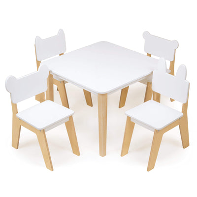 White table with four matching chairs with animal ears on a white background