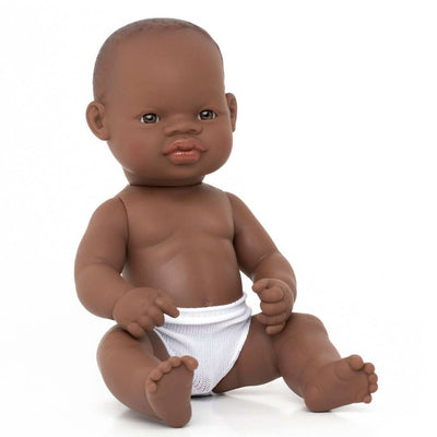 A Miniland 12-inch Realistic Montessori Boy Black Baby Doll.  Anatomically correct and designed for inclusive, educational play.