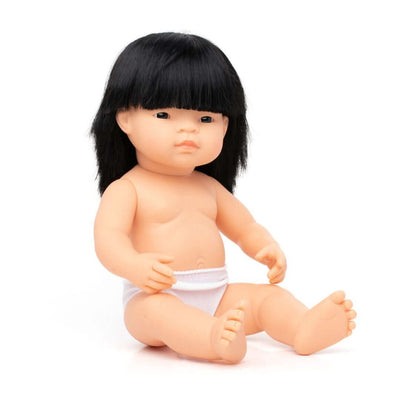 A 12-inch Miniland Realistic Montessori Baby Doll – Asian Girl, featuring black hair, anatomically correct details, and soft vinyl construction. Designed for inclusive, educational play.