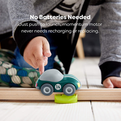 Child playing with a toy HABA car on a wooden track, with text reading "No batteries needed, just push to launch, momentum motor never need recharging or replacing."