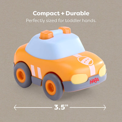 HABA toy car with 3.5" dimensions on a beige background with text reading "Compact and durable, perfectly sized for toddler hands"