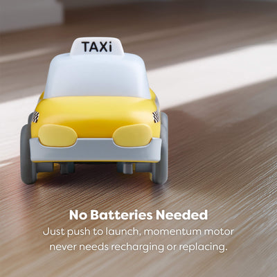 Toy taxi on a wooden surface with text indicating no batteries are needed.