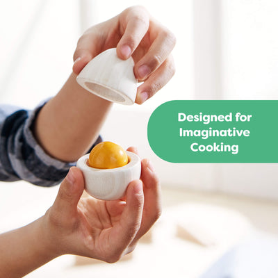 Person holding Creative Play – Wooden Eggs Play Food Set egg, labeled 'Designed for Imaginative Cooking'.