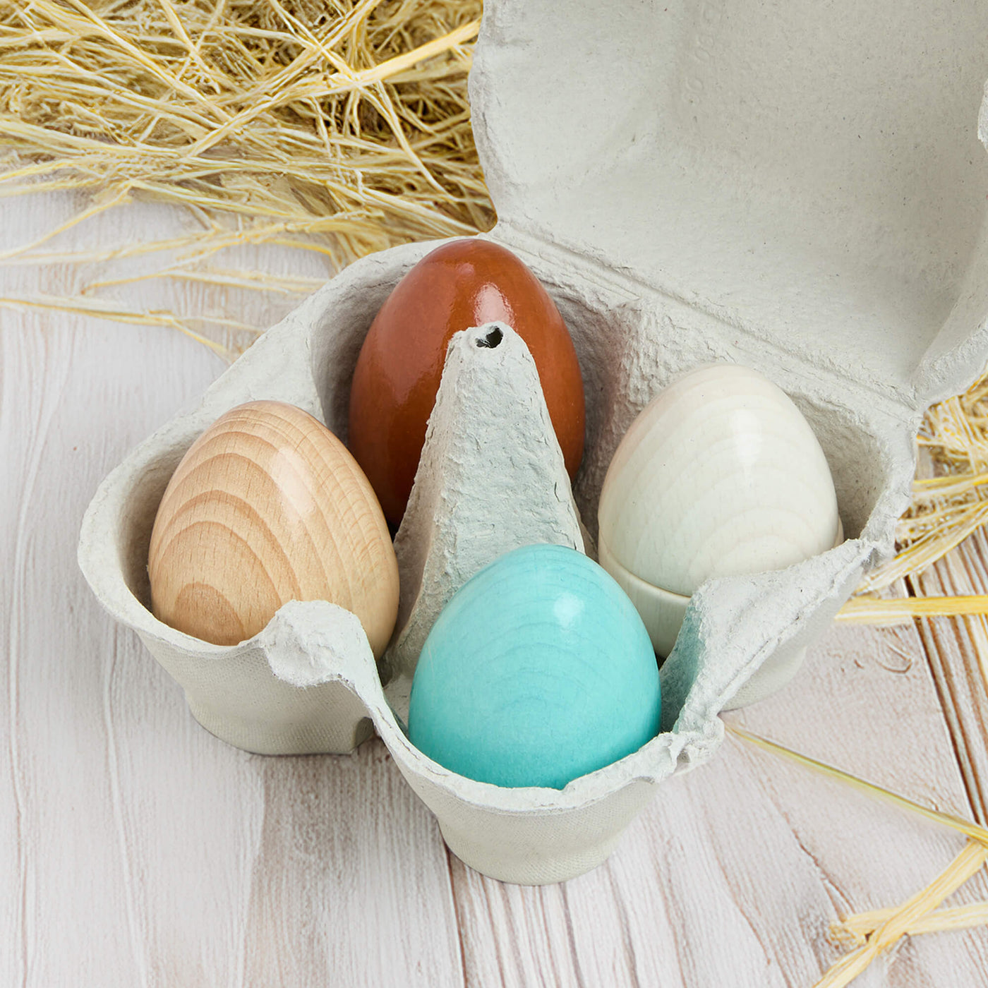 Creative Play – Wooden Eggs Play Food Set with straw on a wooden surface