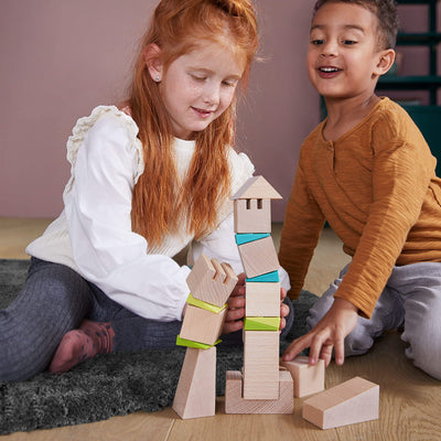 Kids playing with Crooked Tower Wooden Blocks - HABA USA