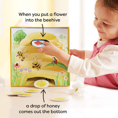 When you put a flower into the beehive, a drop of honey comes out the bottom!