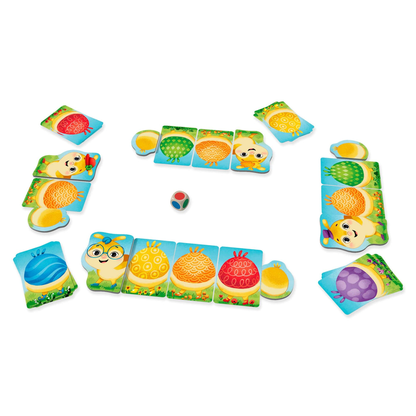 Rainbow Caterpillar game pieces with wooden die