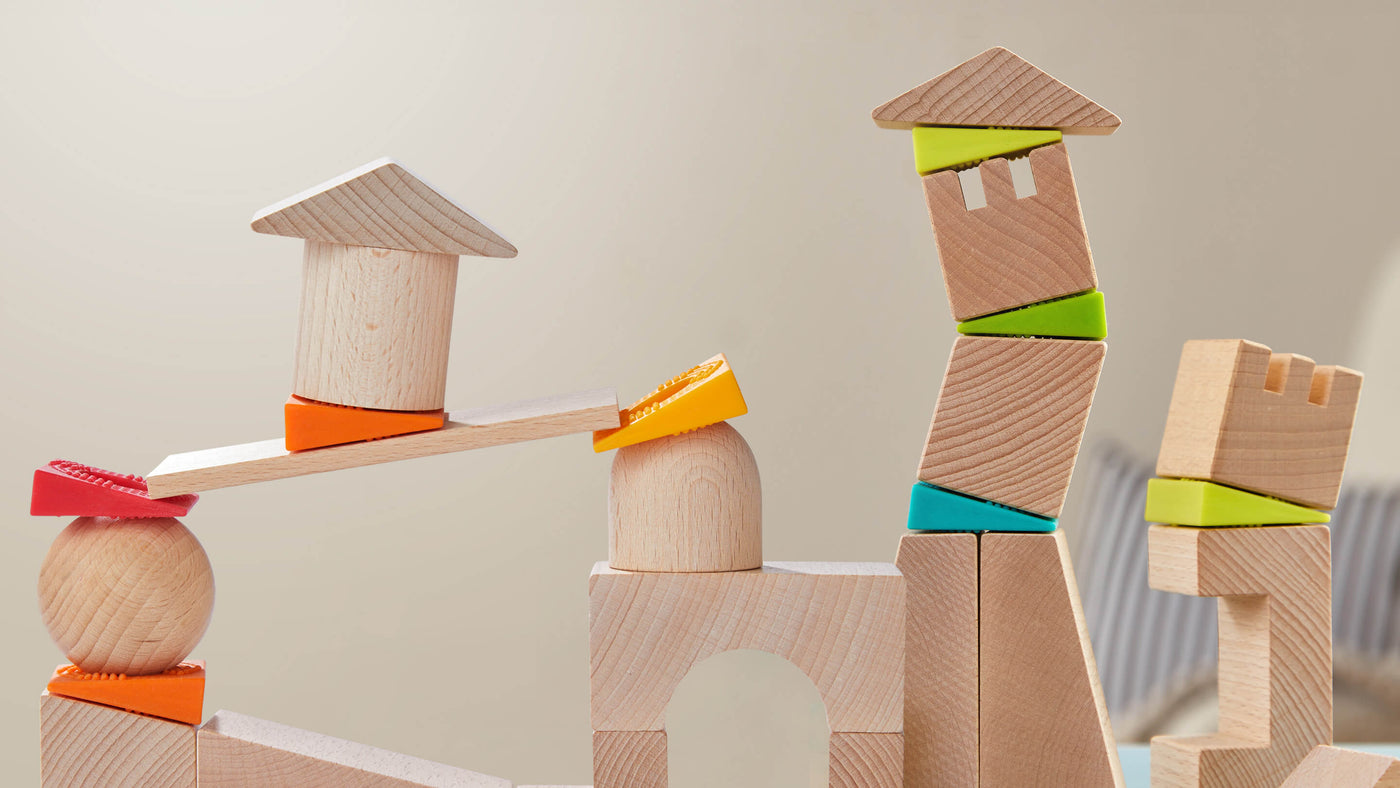 Close up of HABA's Teetering Towers and Crooked Towers Wooden Building Blocks