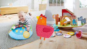 Split image of Farm Water Play Mat on the left and Farm Balancing Act on the right