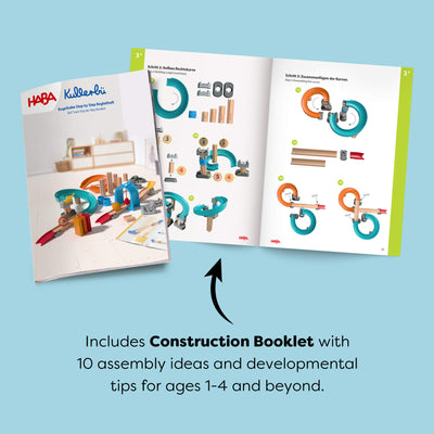 Kullerbu Colorful Curves - Build & Grow Ball Track Set open booklet on a light blue background. Text reads 'Includes Construction Booklet with 10 assembly ideas and developmental tips for ages 1-4 and beyond.'