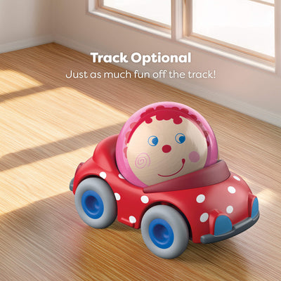 Toy car with a ball inside on a wooden floor, with text 'Track Optional' above.
