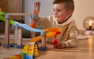Child playing with HABA Kullerbu Track System