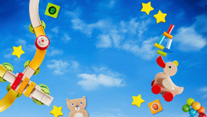 A vibrant and playful arrangement of children's toys against a clear blue sky with scattered white clouds.