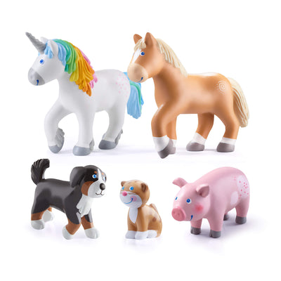 Set of Little Friends figurines including a unicorn, horse, dog, and pig on a white background