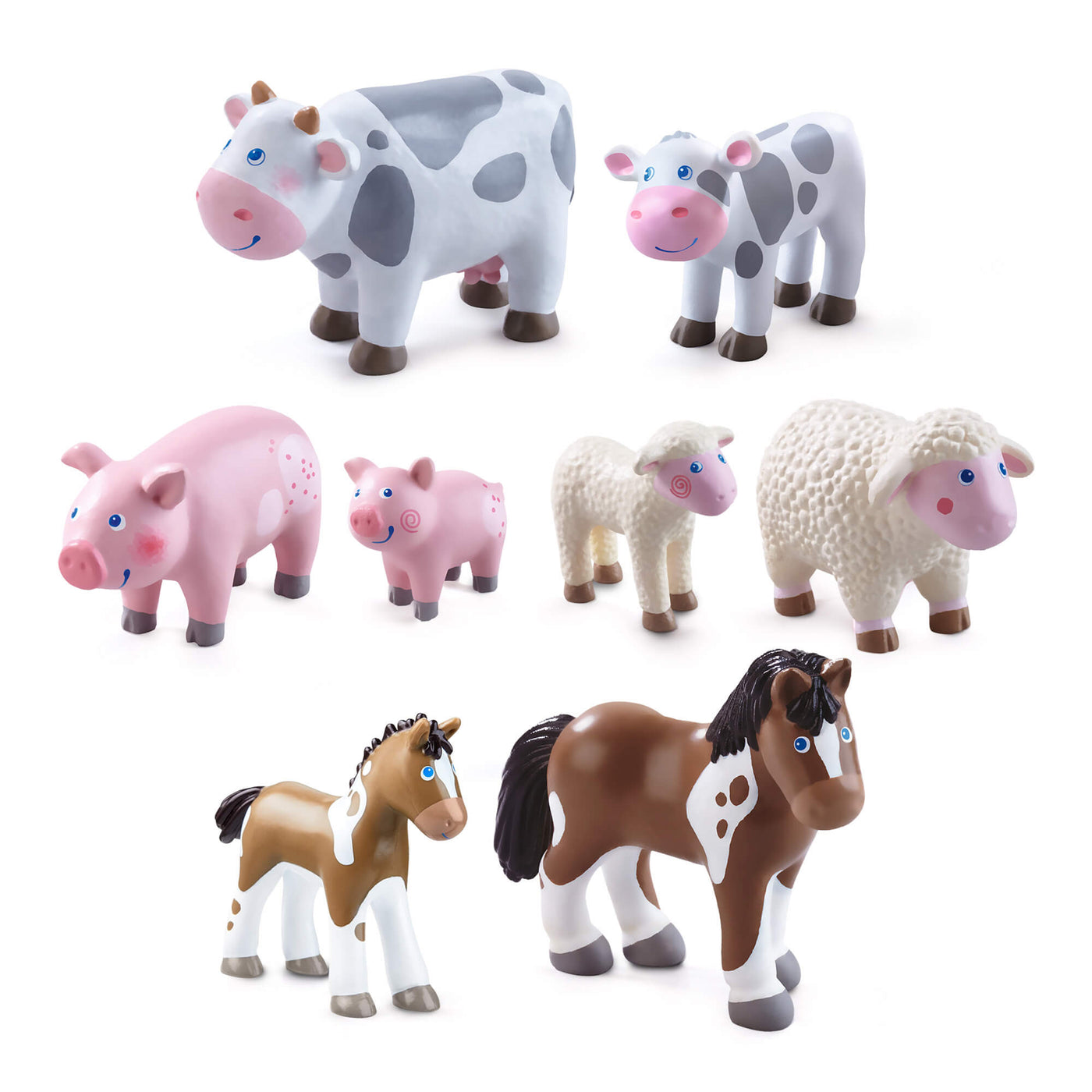 Set of Little Friends farm animal figurines including cows, pigs, sheep, and horses on a white background