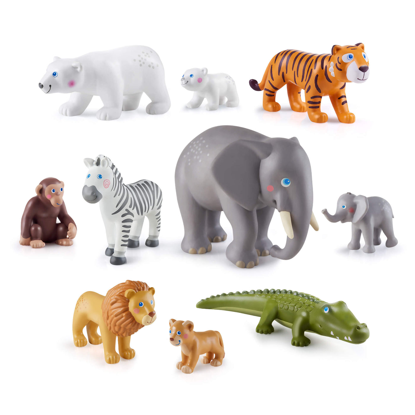 Set of toy Little Friends animal figures including a polar bear, tiger, elephant, zebra, monkey, lion, and crocodile on a white background.