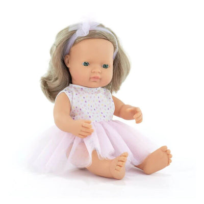 Miniland Realistic Montessori Doll with blonde hair and blue eyes, wearing a lavender polka dot top and pale pink tulle skirt with a matching headband, seated against a white background.