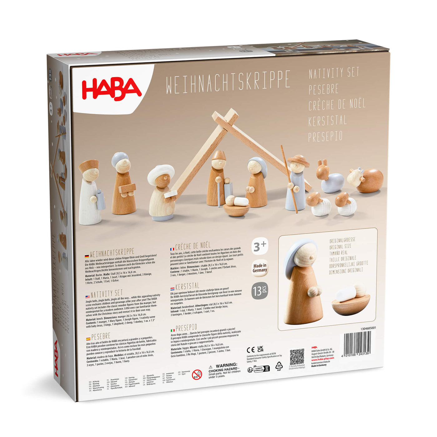 HABA Nativity set back of packaging with wooden figures and stable on a beige background