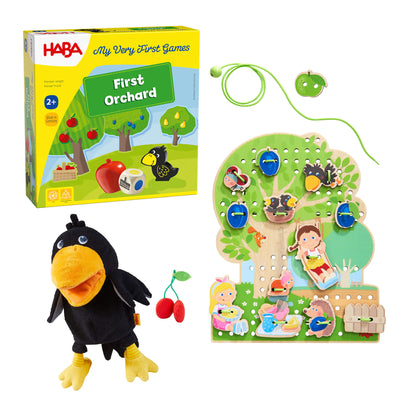 HABA 'First Orchard' game set with bird puppet and tree threading board on a white background