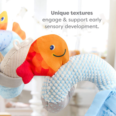 Close up of Penguin Activity Spiral fish, text reads 'Unique textures support early sensory development'
