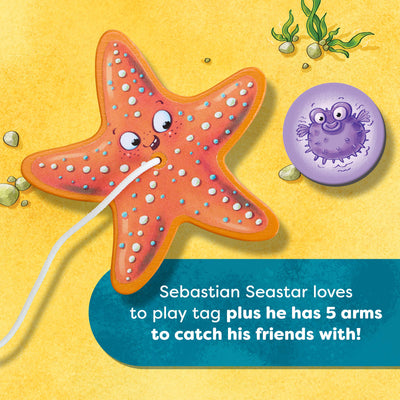 Cartoon starfish with a purple blowfish from the HABA game Sebastian Seastar, text reads 'Sebastian Seastar loves to play tag plus he has 5 arms to catch his friends with!'