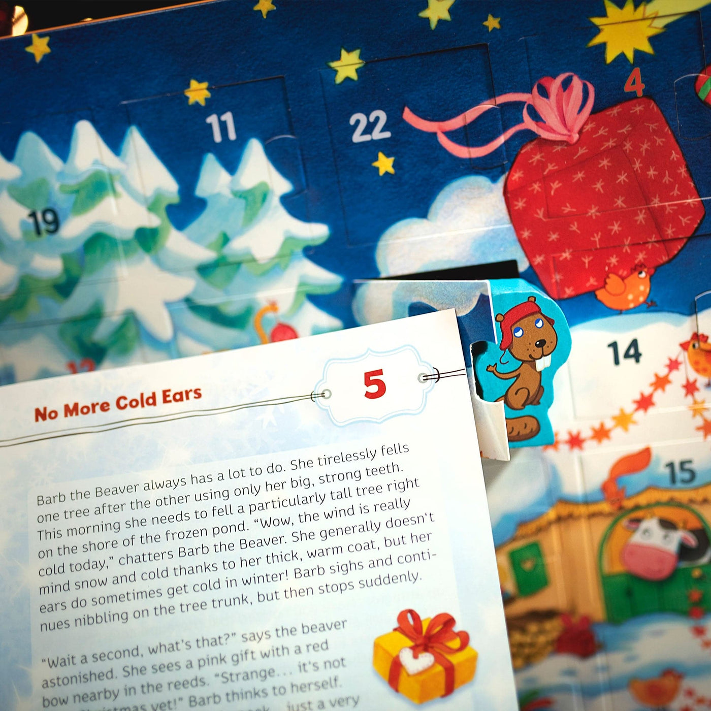 My First Advent Calendar window opening with a beaver coming out and a book in front of it with the headline "No More Cold Ears"